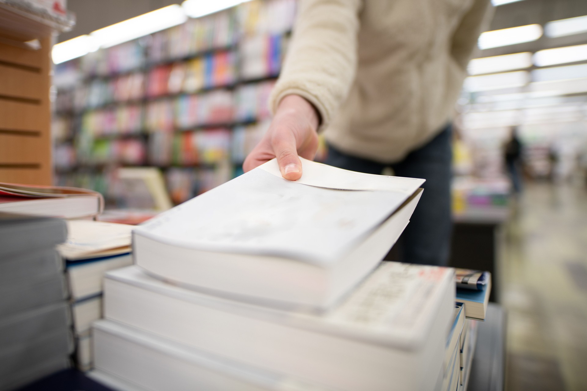 Shoppers choosing books at a bookstore
